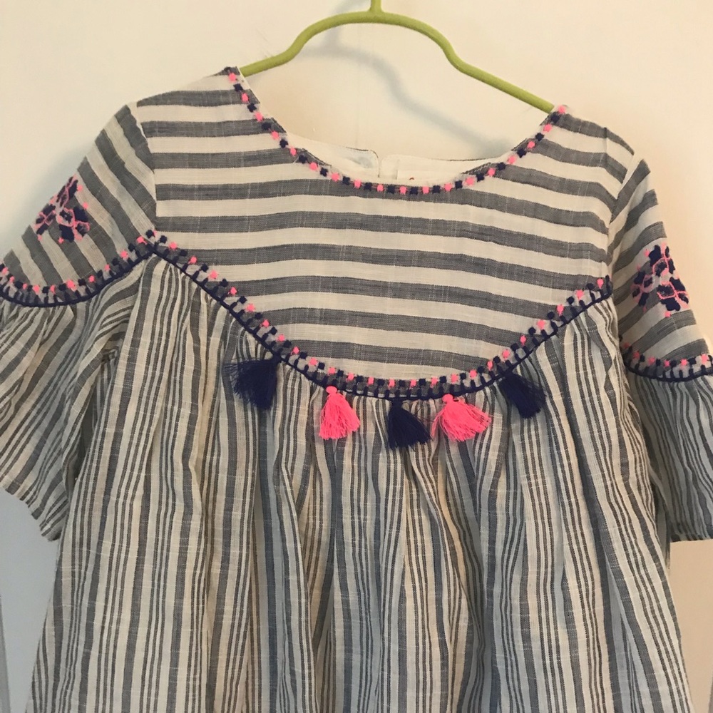 Very cute gently used Cat&Jack Pom Pom shirt.